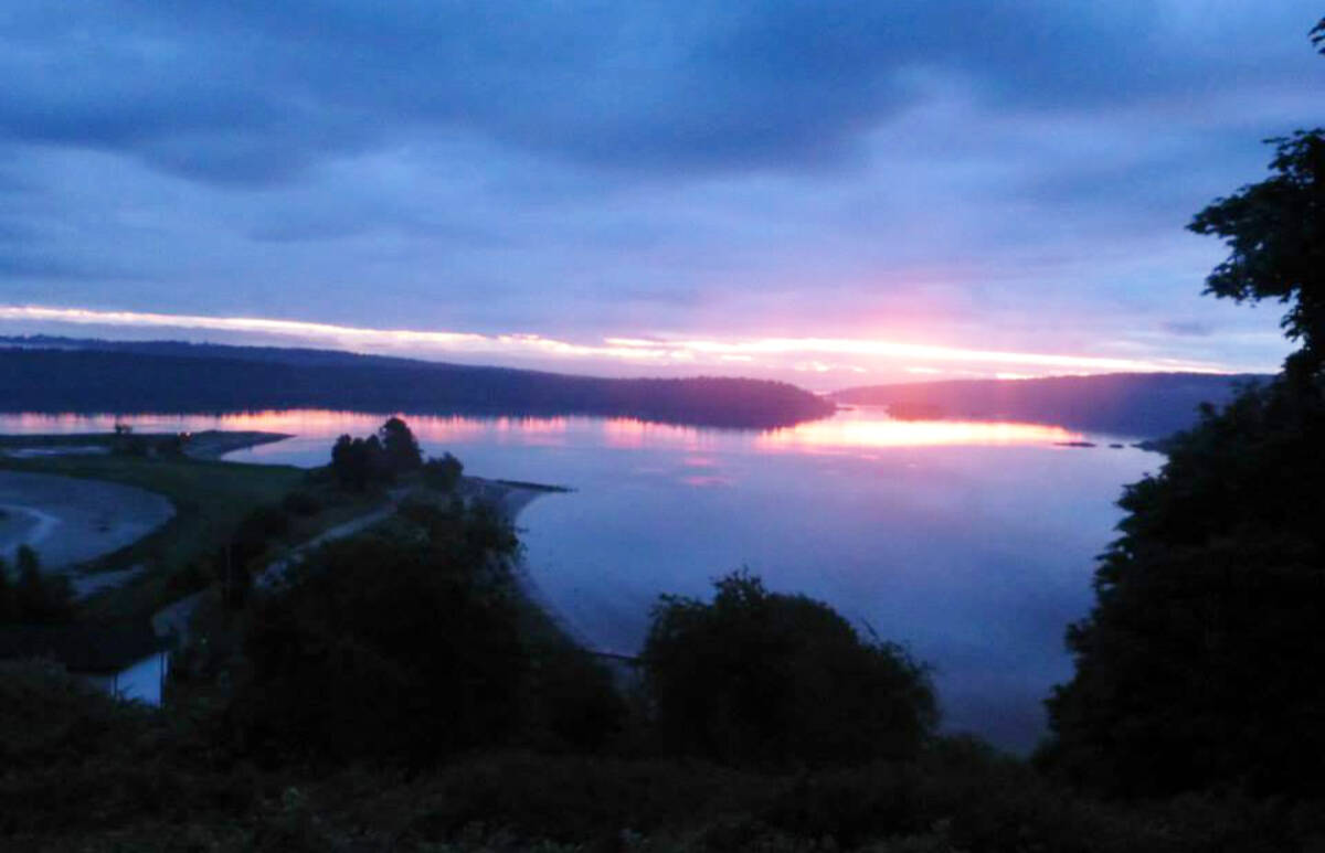 Rays of light infiltrate the clouds during a sunset in October. (Photo by Donna L. Brown)