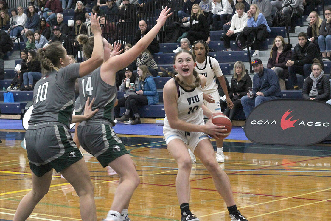 VIU Mariners player Harriette Mackenzie heads for the basket during a game against the Douglas Royals on Friday, Nov. 18, at the Vancouver Island University gym. Mackenzie had 23 points and 23 rebounds in the game. (Greg Sakaki/News Bulletin)