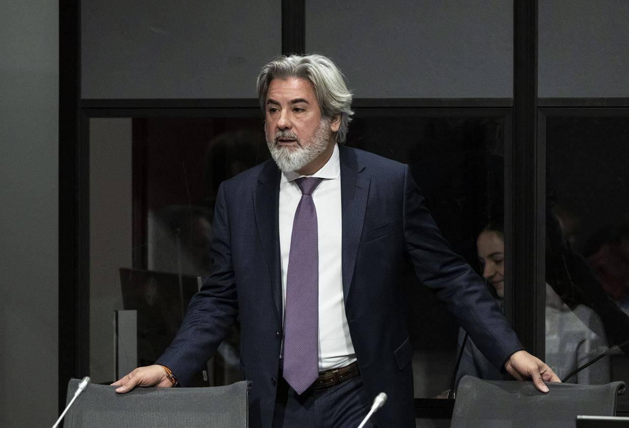 Minister of Canadian Heritage Pablo Rodriguez prepares to appear before the Senate Committee on Transport and Communications on Bill C-11, in the Senate of Canada Building in Ottawa, on Tuesday, Nov. 22, 2022. THE CANADIAN PRESS/Justin Tang