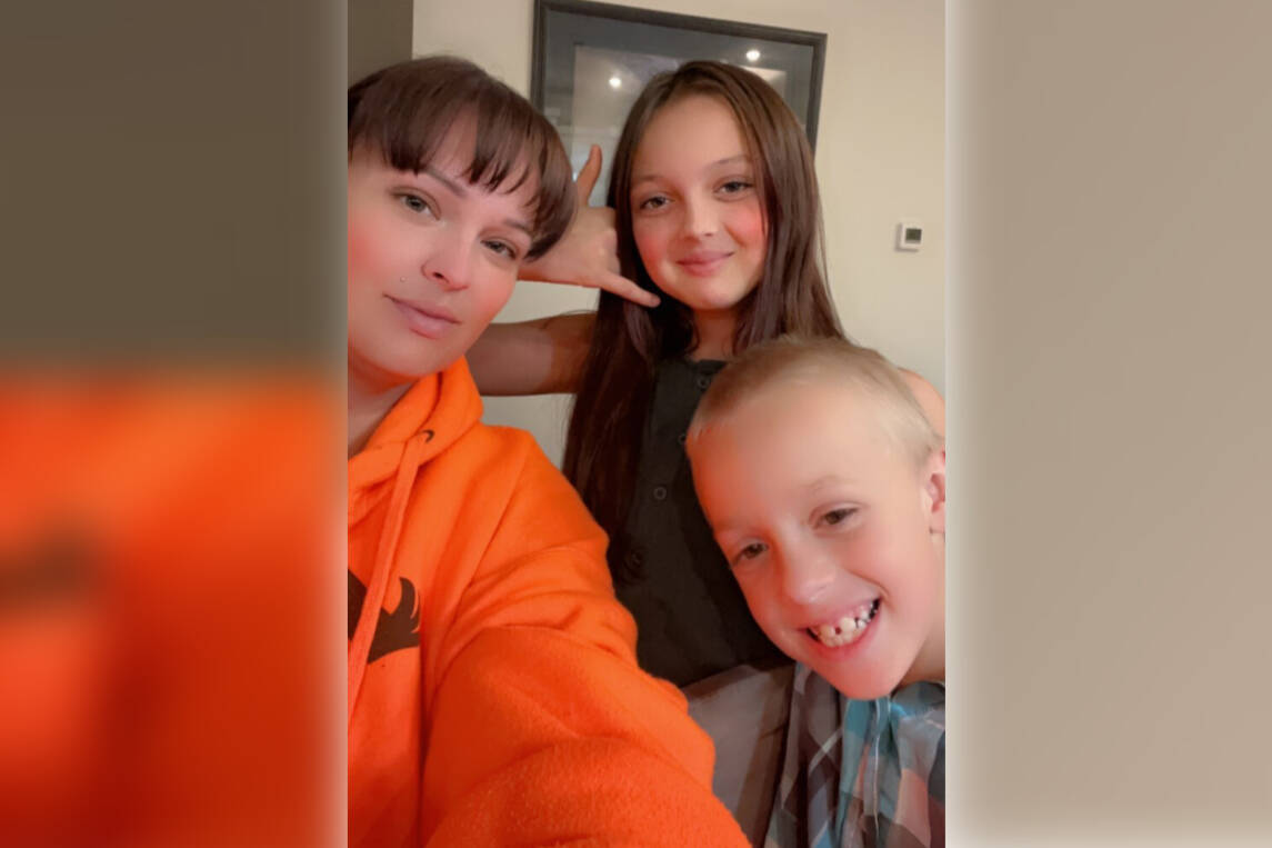 Kandace with her kids, age 7 and 11. Kandace works full time at the Penticton hospital and still can’t make ends meet. She worries how she’ll keep a roof over their heads in 2023. (Submitted)