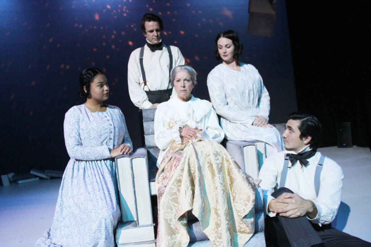 A serene group surrounds Scrooge (Louise Phillips) in the Chemainus Theatre Festival’s A Tiny Christmas Carol. From left: Yasmin D’Oshun, Jay Clift, Emma Slipp and Stephen Thakkar. (Photo by Don Bodger)