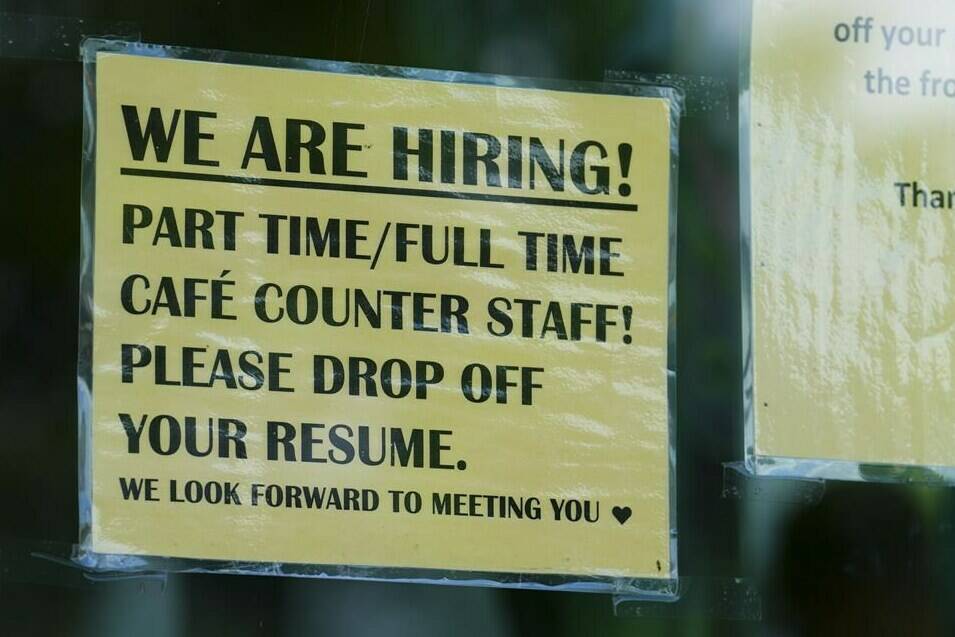 A sign for help wanted is pictured in a business window in Ottawa on Tuesday, July 12, 2022. A new census release from Statistics Canada Wednesday is expected to shed light on the changing dynamics of the Canadian labour force as well as how people got to work last year. THE CANADIAN PRESS/Sean Kilpatrick