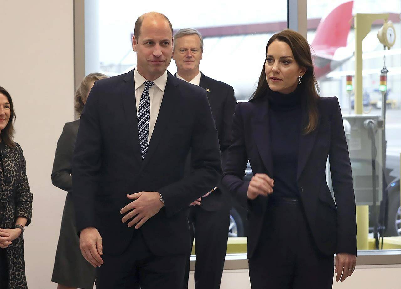 Britain’s Prince William and Kate, Princess of Wales, arrive at Boston Logan International Airport, Wednesday, Nov. 30, 2022, in Boston. They were met by Massachusetts Gov. Charlie Baker, rear, and first lady Lauren Baker. The Prince and Princess of Wales are making their first overseas trip since the death of Queen Elizabeth II in September. (John Tlumacki/The Boston Globe via AP, Pool)