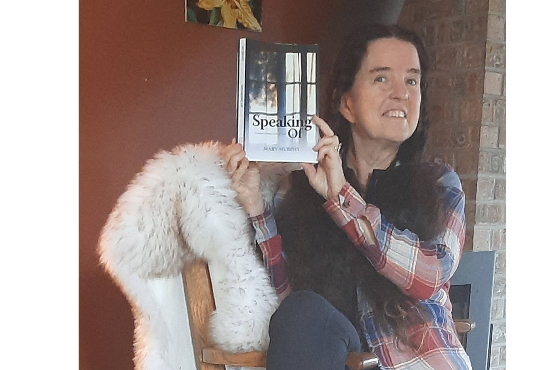 Mary Murphy and her latest novel, <em>Speaking Of.</em> She will be having a book launch on Dec. 3. Photo supplied