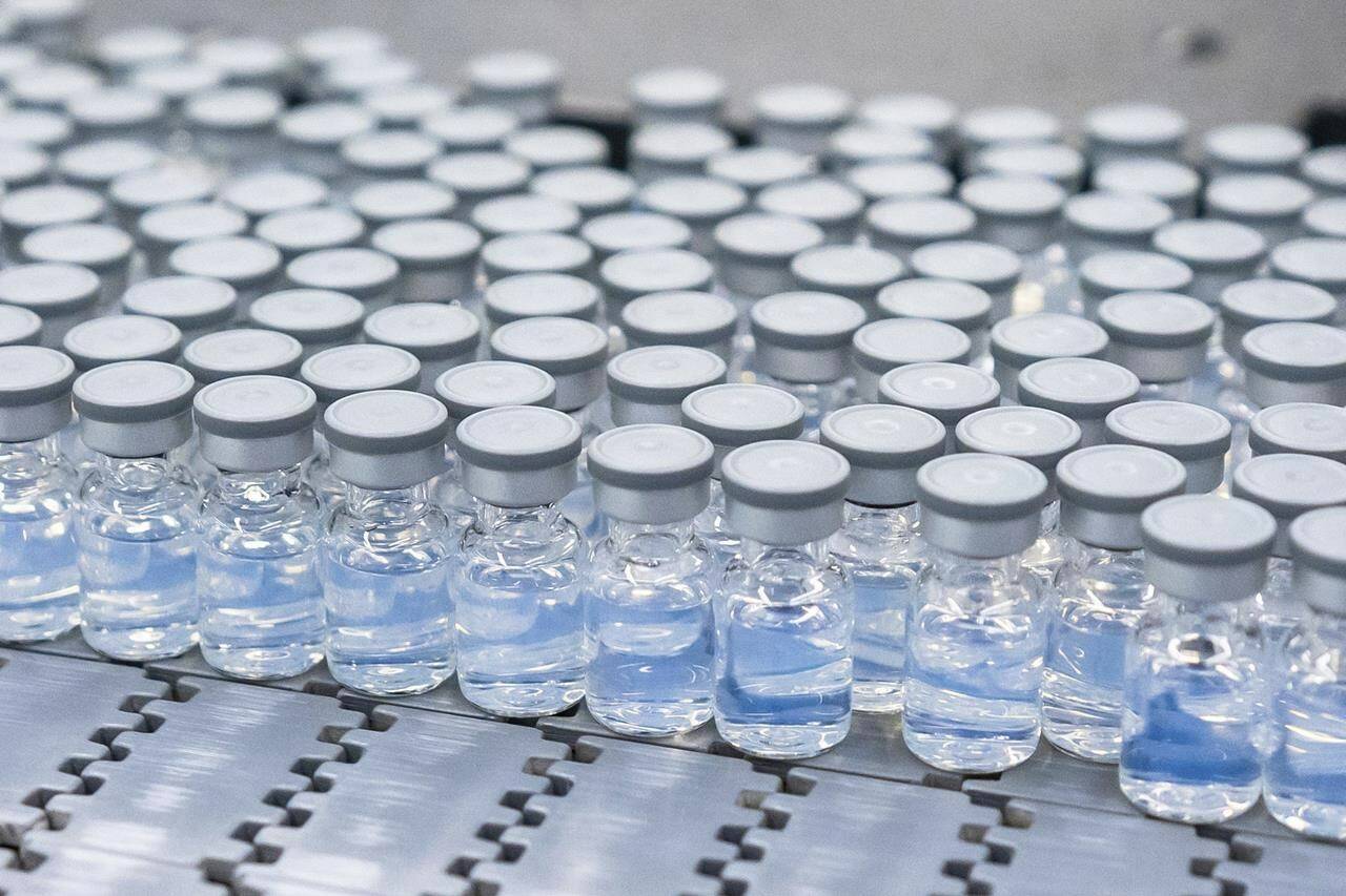 Vials of Pfizer’s updated COVID-19 vaccine is seen during production in Kalamazoo, Mich., in an Aug. 2022, handout photo. Health Canada has approved a Pfizer-BioNTech COVID-19 vaccine booster for use in children ages five to 11, which targets the original strain of the coronavirus and more recent variants. THE CANADIAN PRESS/AP-HO, Pfizer