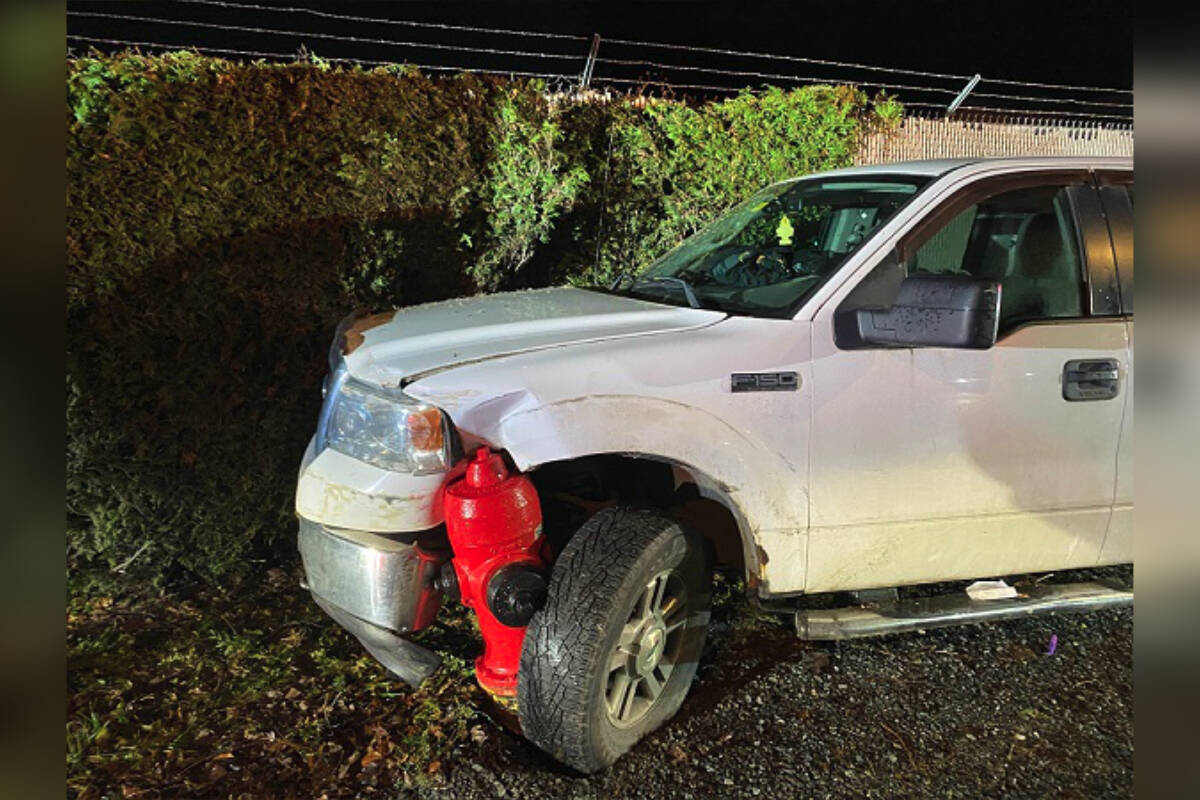 A 54-year-old man was arrested Friday (Dec. 9) morning for impaired driving and possession of stolen property after the West Shore RCMP responded to a scene where a stolen pickup truck had crashed into a fire hydrant in Langford. (Courtesy of West Shore RCMP)