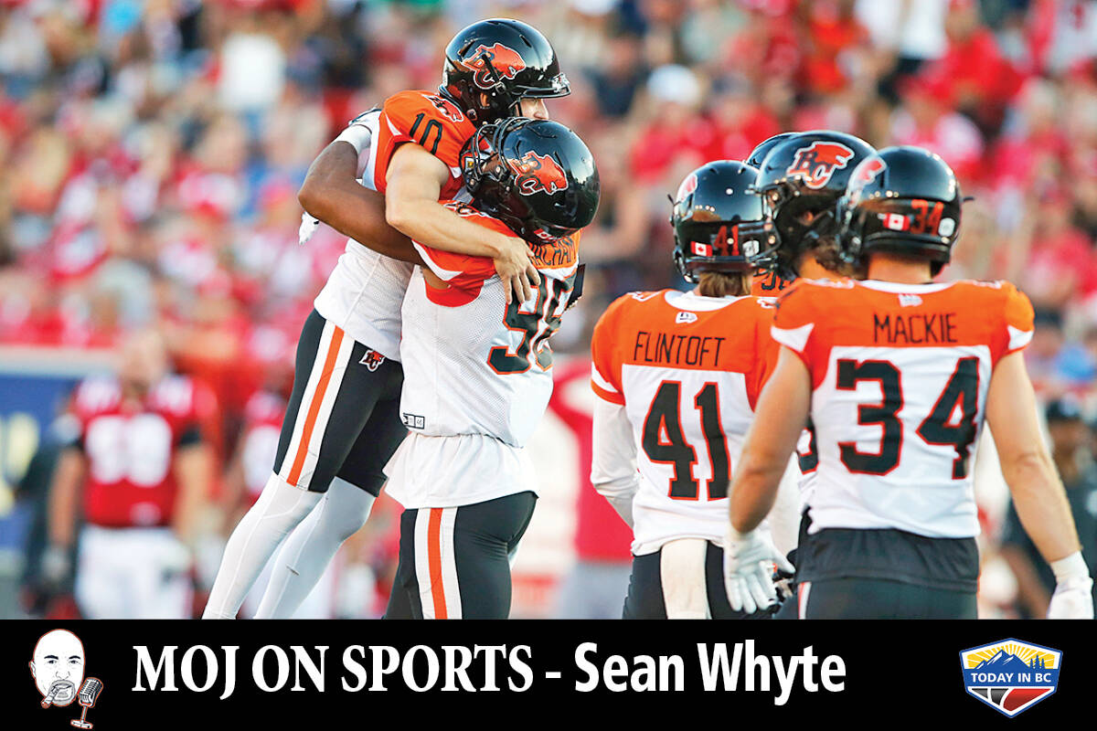 BC Lions kicker Sean Whyte, left, celebrates a field goal with defensive end Obum Gwacham (98) against the Calgary Stampeders in Calgary, Saturday, Aug. 13, 2022. (Photo: THE CANADIAN PRESS/Larry MacDougal)