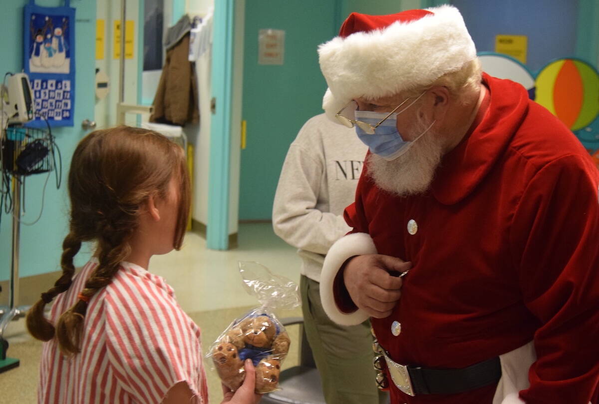 Santa delivers gifts at Victoria General Hospital. (Brendan Mayer/News Staff)