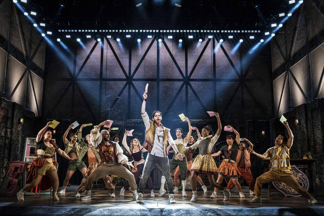 This image released by Grapevine Public Relations shows Stark Sands, center, and the cast during a performance of “& Juliet.” (Matthew Murphy/Grapevine Public Relations via AP)
This image released by Grapevine Public Relations shows Stark Sands, center, and the cast during a performance of “& Juliet.” (Matthew Murphy/Grapevine Public Relations via AP)