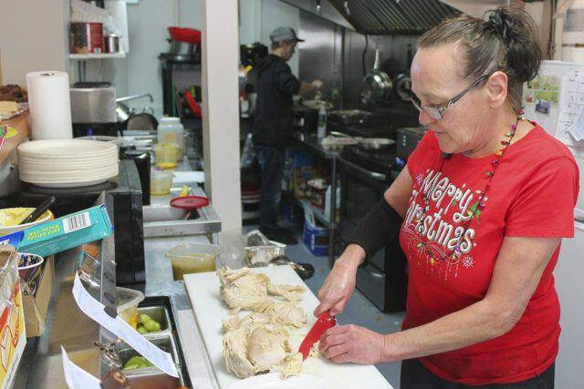 Cathy Gouk of Cathy’s Corner Cafe prepares a Christmas meal. (File - Sooke News Mirror)