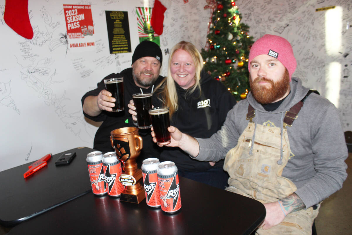 A Canada Beer Cup bronze is a good reason for the Riot Brewing gang to celebrate. From left: Ralf Rosenke, Aly Tomlin and Jesse Grass. (Photo by Don Bodger)