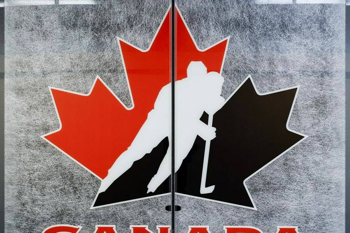 A Hockey Canada logo is seen on the door to a meeting room at the organizations head office in Calgary, Alta., Sunday, Nov. 6, 2022. Hockey Canada’s provincial and territorial members will vote today on whether to approve a slate of nominees to fill the organization’s nine vacancies on its board of directors.THE CANADIAN PRESS/Jeff McIntosh