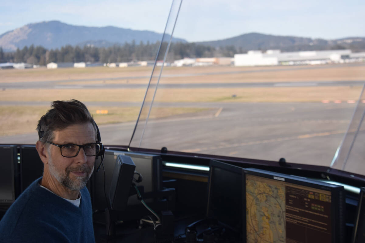 Victoria International Airport air traffic control unit operations specialist Jason Grist watches over the runway on Thursday, Dec. 15. For those who work inside the control tower, Christmas is just another day at the office. (Austin Westphal/News Staff)