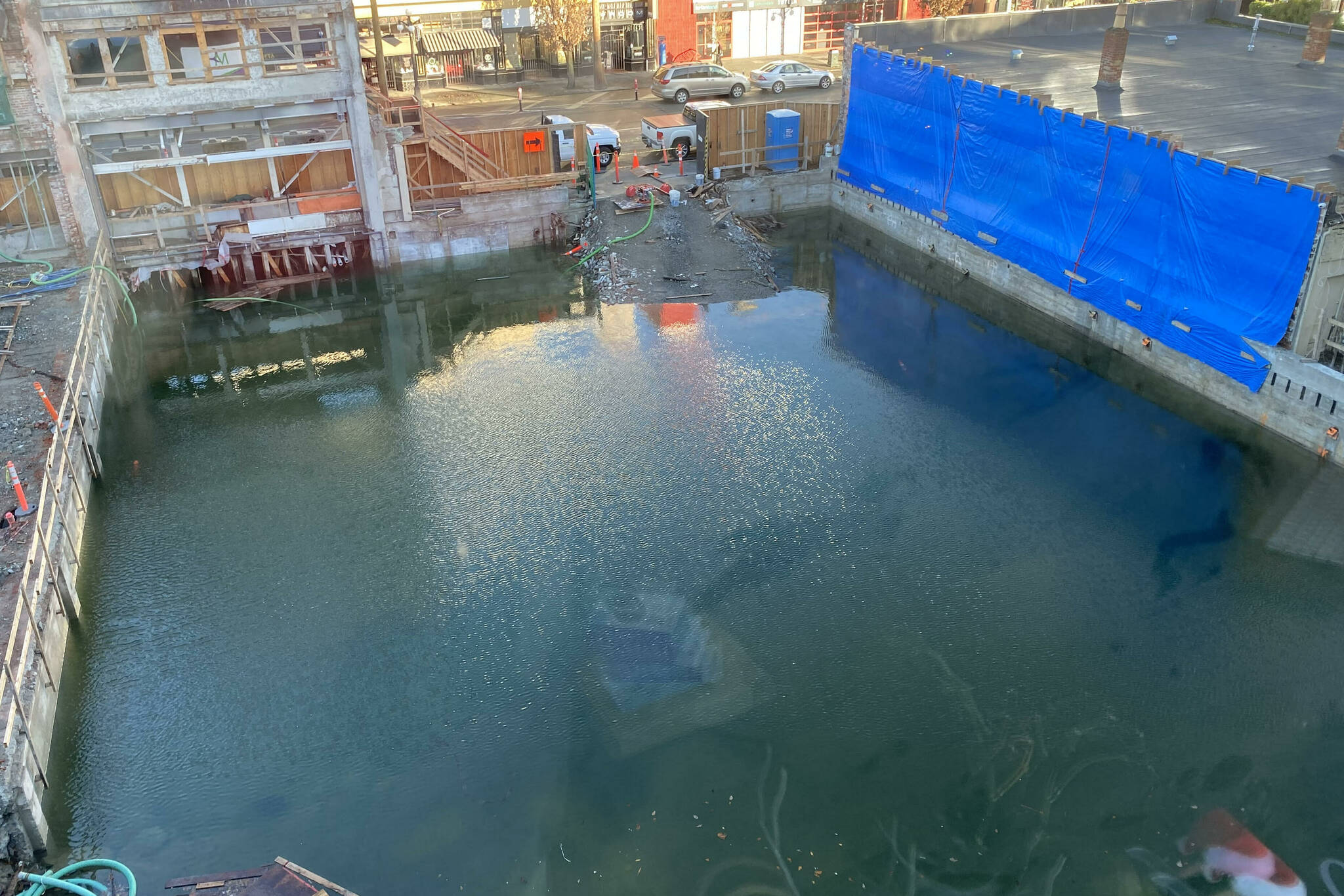 This construction site on Fort Street has become a swimming pool thanks for snow and then heavy rain. (Chris Campbell photo)