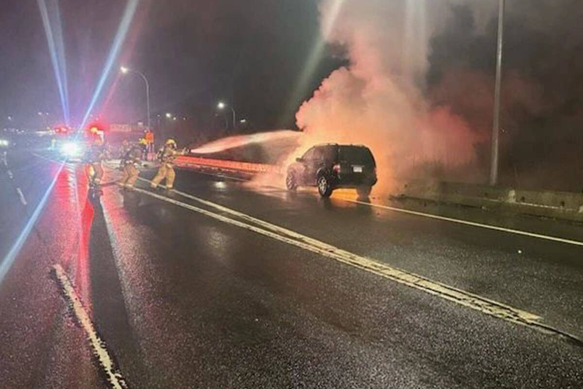 Crews with North Saanich Fire Department responded to a car fire near the northbound McTavish Road exit on Highway 17 Wednesday evening. (North Saanich Volunteer Firefighters Association/Facebook)