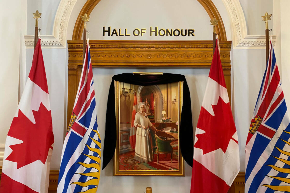 A portrait of Queen Elizabeth II inside the B.C. legislature building was adorned in black to mark her death. (Black Press Media file photo)