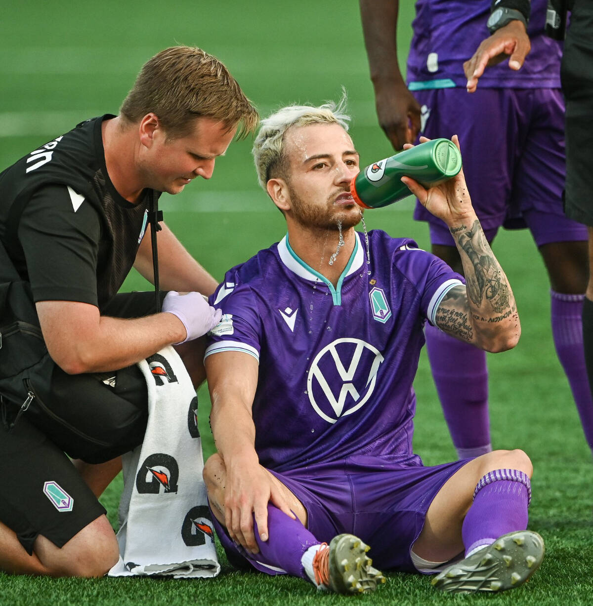 Marco Bustos takes on water during Pacific FC’s playoff game against Atletico Ottawa at Starlight Stadium in Langford on Sunday (Oct. 16). (Simon Fearn/Black Press Media)