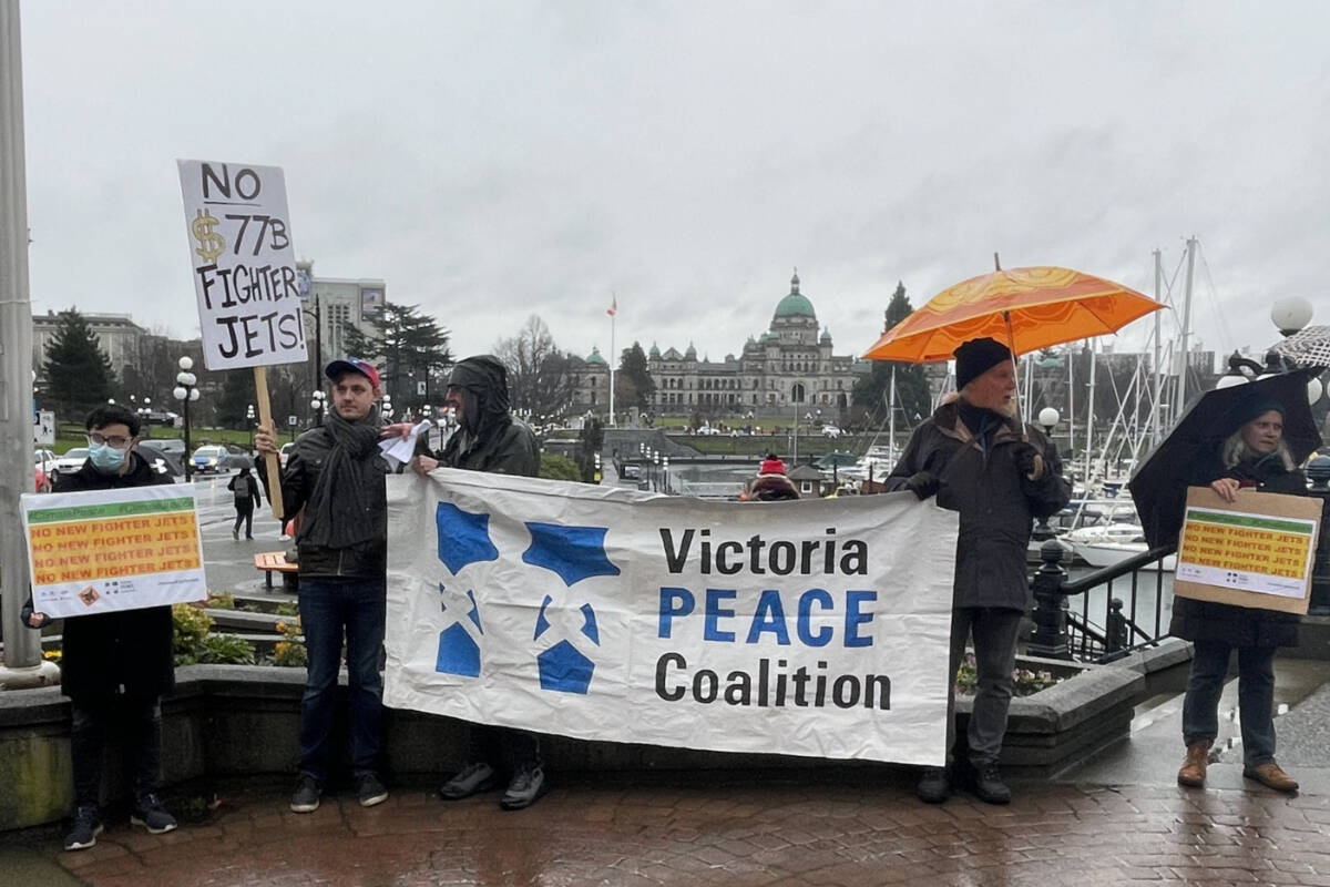 Protestors from the Victoria Peace Coalition gathered January 7 on the corner of Government Street and Humboldt Street to protest against the federal purchase of 88 fighter-jets. (Hollie Ferguson/News Staff)