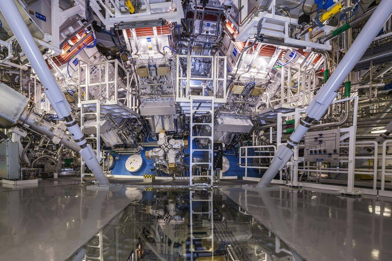 FILE - This undated image provided by the National Ignition Facility at the Lawrence Livermore National Laboratory shows the NIF Target Bay in Livermore, Calif. The system uses 192 laser beams converging at the center of this giant sphere to make a tiny hydrogen fuel pellet implode. (Damien Jemison/Lawrence Livermore National Laboratory via AP, File)