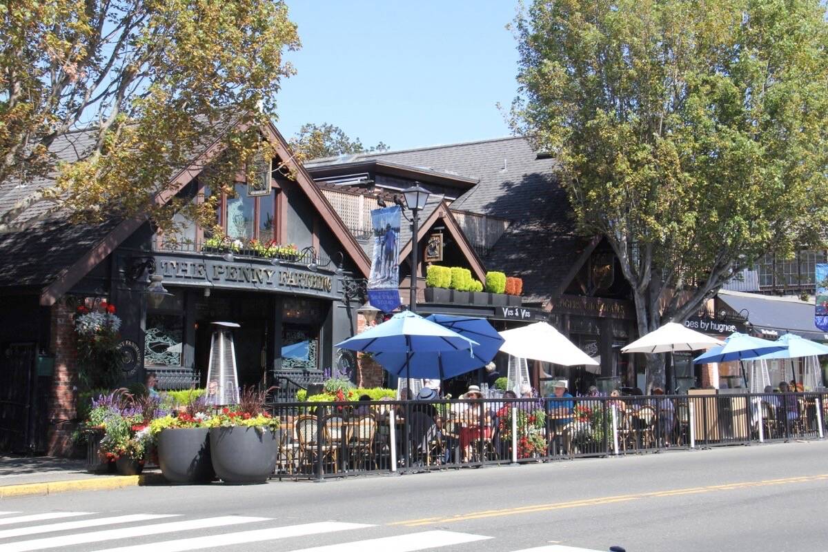 Oak Bay wants to hear from residents as it develops policy to allow food and beverage businesses to use of public space such as the Penny Farthing street side patio created during the early days of the COVID-19 pandemic. (Christine van Reeuwyk/News Staff)
