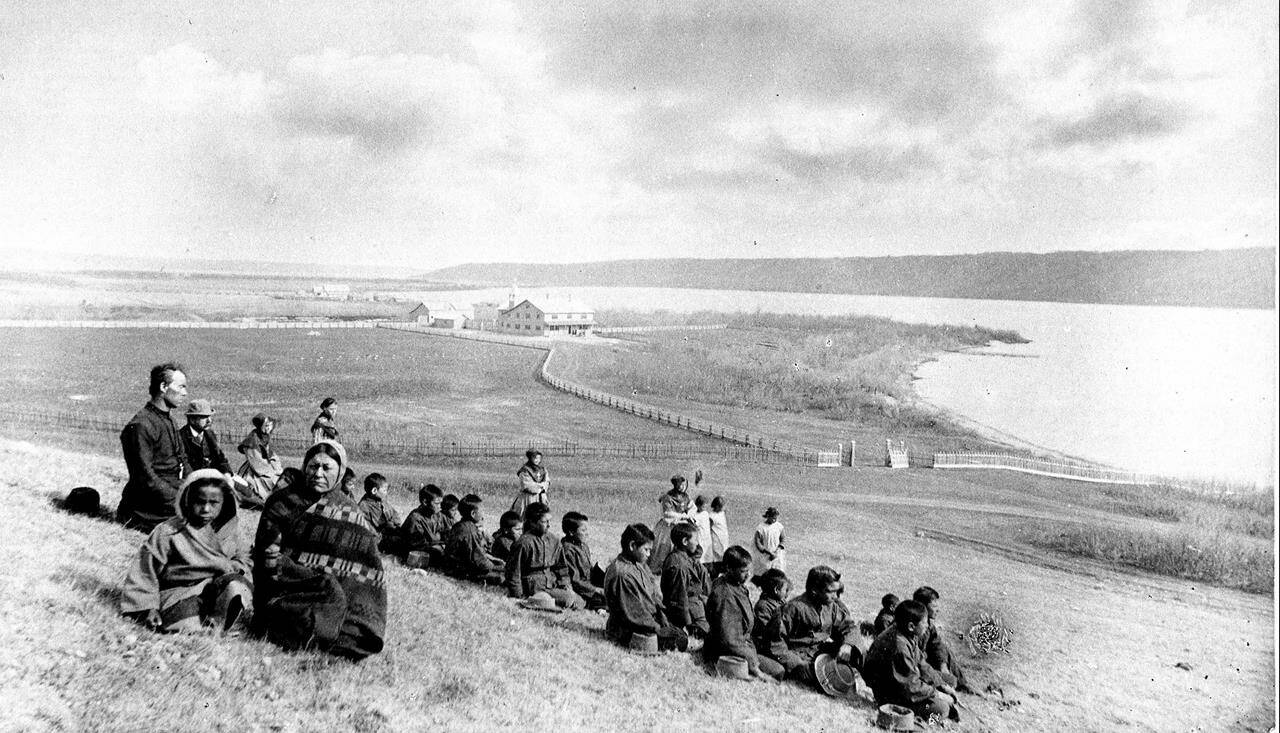 The Star Blanket Cree Nation, northeast of Regina, has announced the discovery of possible graves after a ground-penetrating radar search of the former site of the Qu’Appelle Indian Residential School. Aboriginal students, principal Father Joseph Hugonnard, and staff, including the Grey Nuns, of the industrial School are shown in Fort Qu’Appelle, Sask., in this May 1885 file photo. THE CANADIAN PRESS/National Archives of Canada/O.B. Buell - PA-118765