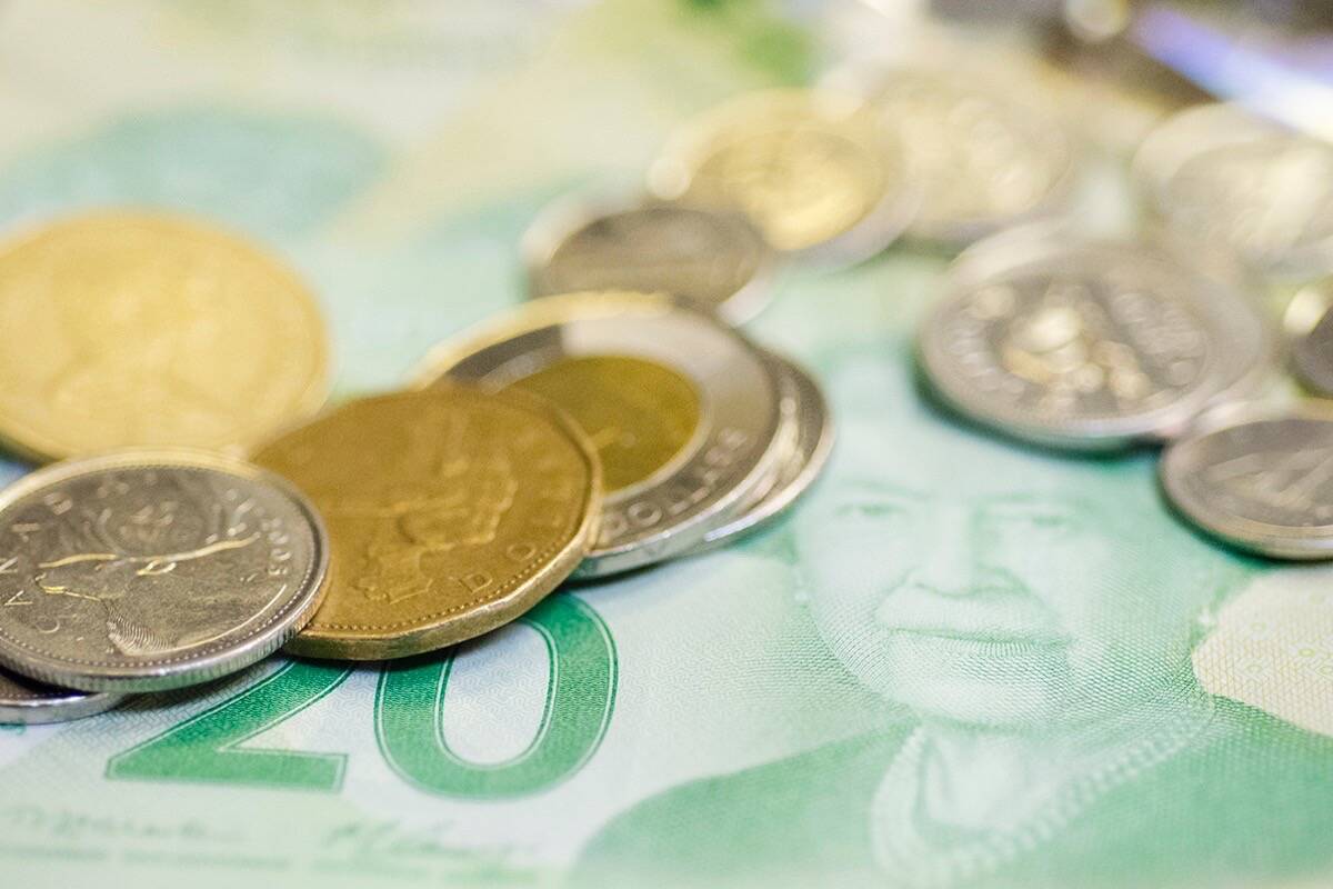 An analyst says inflation is eroding household budgets at the same time overleveraged Canadians face sharply rising borrowing costs. (Black Press file)