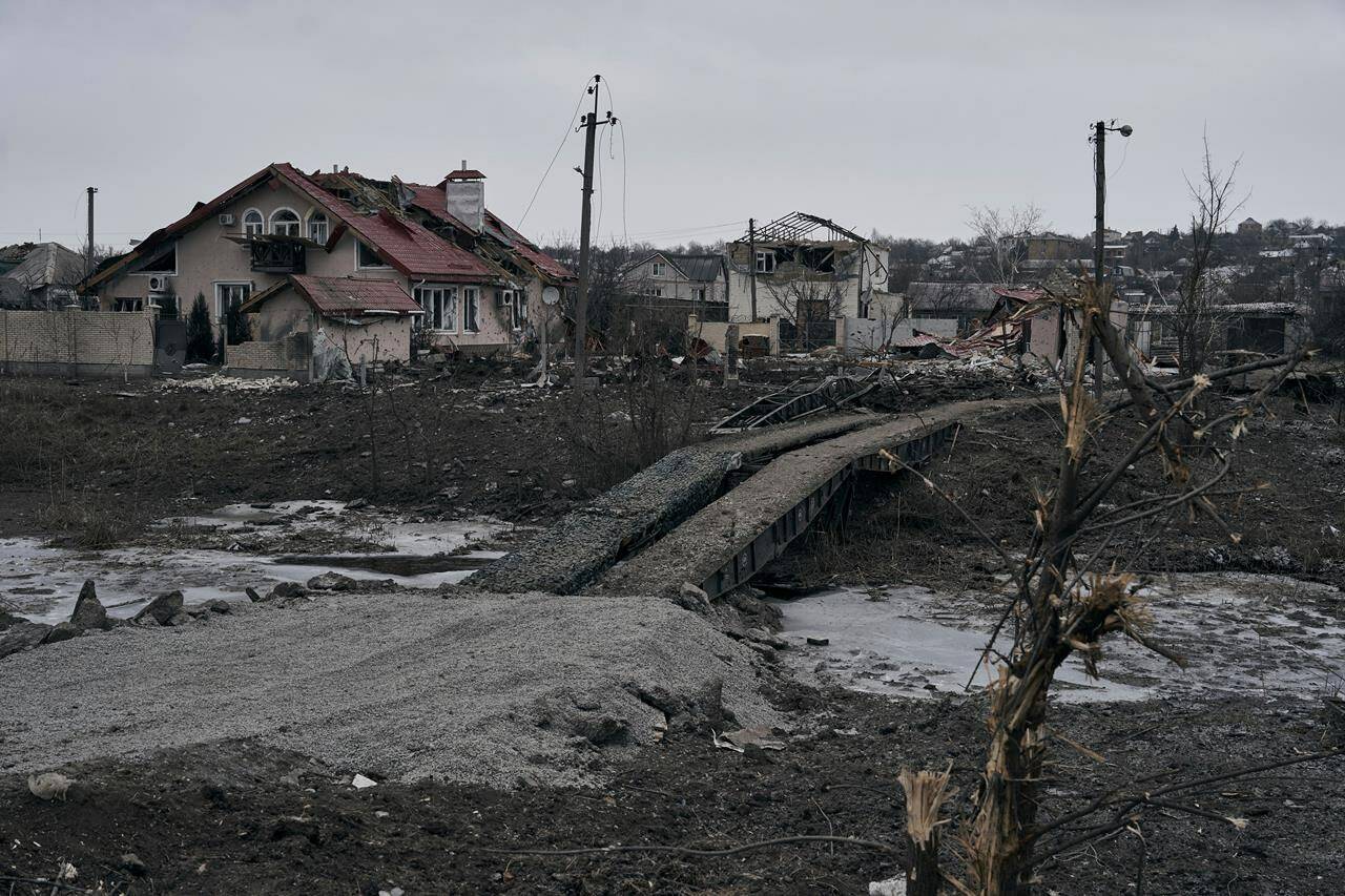 Global Affairs Canada says it's aware of the death of a Canadian citizen, in response to a question about reports a young medical student fighting with Ukrainian forces was killed in battle Sunday, near the city of Bakhmut. Damaged buildings and houses are seen in Bakhmut, Ukraine, Thursday, Jan. 12, 2023. THE CANADIAN PRESS/AP-LIBKOS