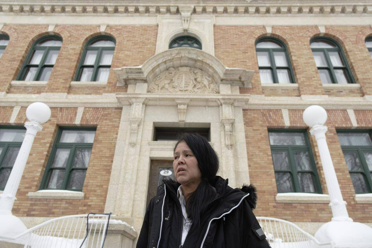 Odelia Quewezance speaks to media outside the Court of King’s Bench in Yorkton, Sask. on Tuesday, Jan. 17, 2023. Lawyers for two women who spent nearly 30 years in prison are to argue why they should be released while they await the results of a federal conviction review at the second day of a bail hearing. Odelia and Nerissa Quewezance were convicted in 1994 of second-degree murder in the death of 70-year-old Saskatchewan farmer Anthony Joseph Dolff. THE CANADIAN PRESS/Michael Bell