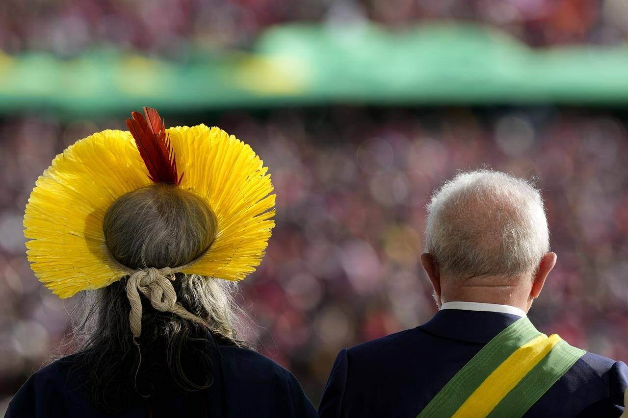 FILE - Luiz Inacio Lula da Silva stands next to Indigenous leader Cacique Raoni at the Planalto Palace after he was sworn in as new president in Brasilia, Brazil, Sunday, Jan. 1, 2023. Environmentalists, Indigenous people and voters sympathetic to their causes were important to Luiz Inácio da Silva’s election to a third term as Brazil’s president.(AP Photo/Eraldo Peres, file)