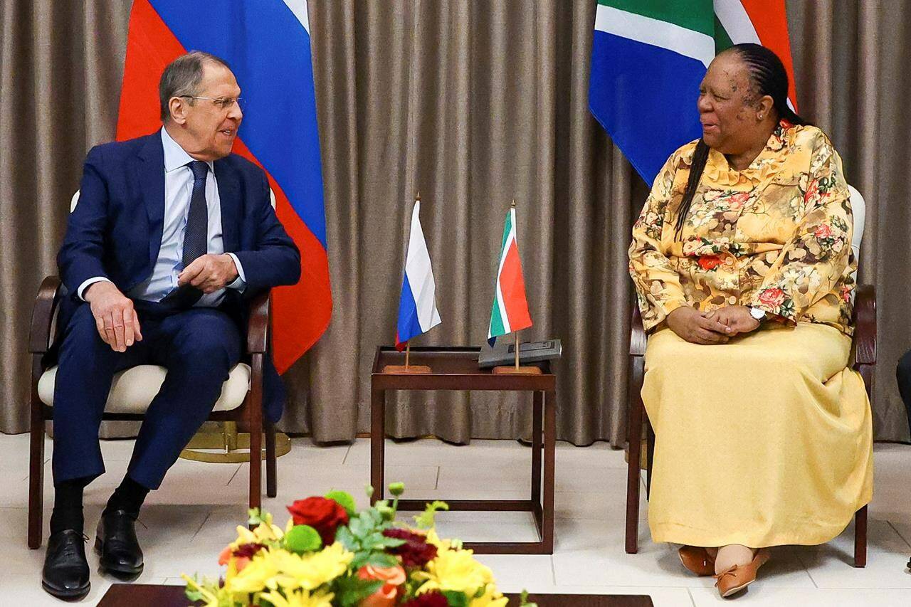 In this photo released by the Russian Foreign Ministry Press Service, Russia’s Foreign Minister Sergey Lavrov, left, and his South Africa’s counterpart Naledi Pandor, speak, during their meeting in Pretoria, South Africa, Monday, Jan. 23, 2023. (Russian Foreign Ministry Press Service via AP)