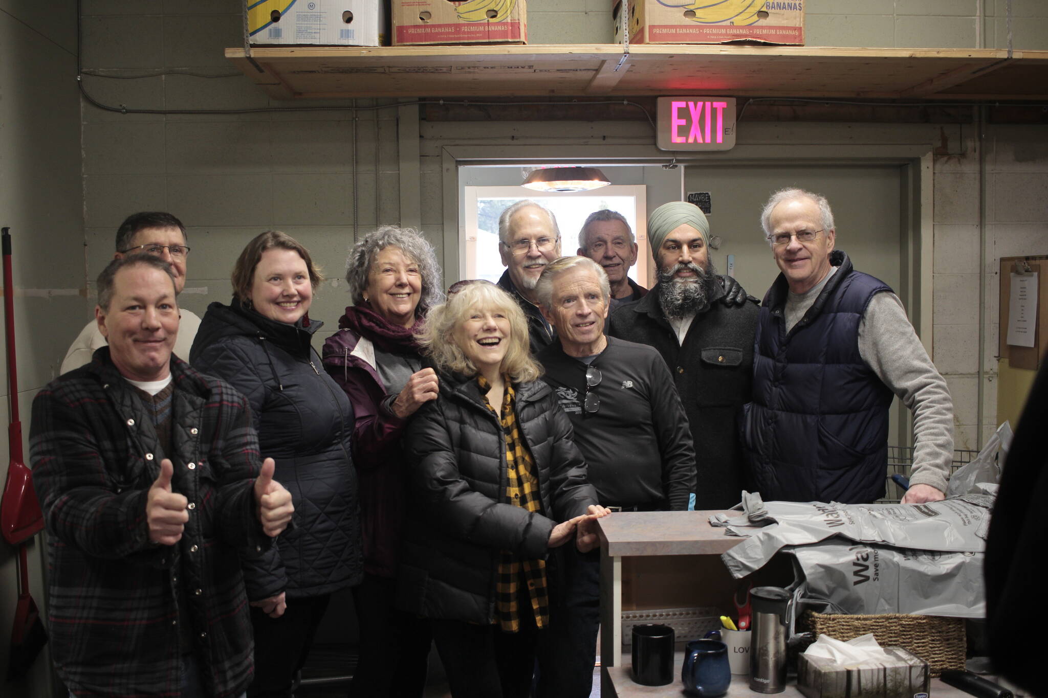 Volunteers and staff at the Campbell River Food Bank pose with North Island-Powell River MP Rachel Blaney (third from left) and NDP Leader Jagmeet Singh (second from right). Photo by Marc Kitteringham/Campbell River Mirror