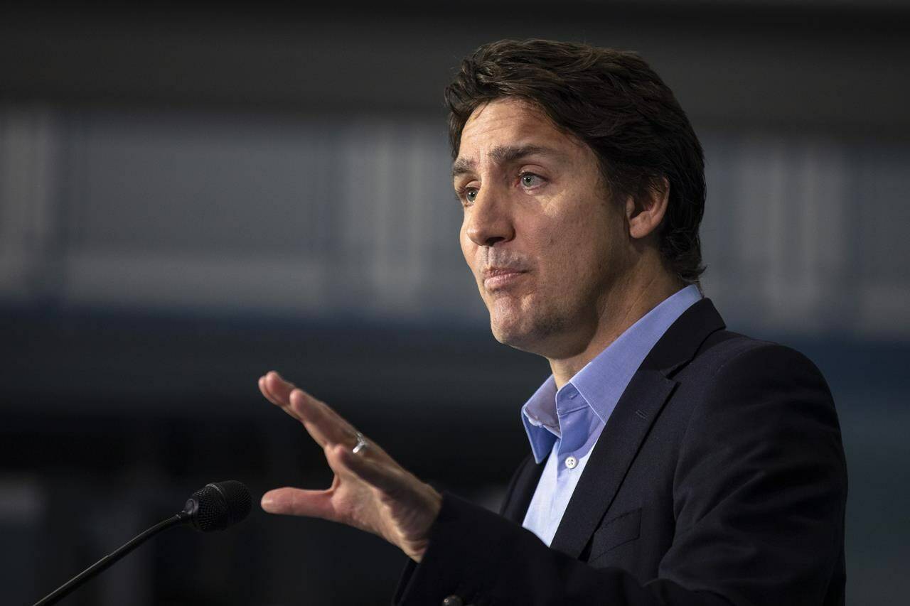 Prime Minister Justin Trudeau speaks to the media at the McMaster Automotive Resource Centre in Hamilton, Ont., during the final day of meetings at Liberal cabinet retreat on Wednesday, Jan. 25, 2023. THE CANADIAN PRESS/Nick Iwanyshyn