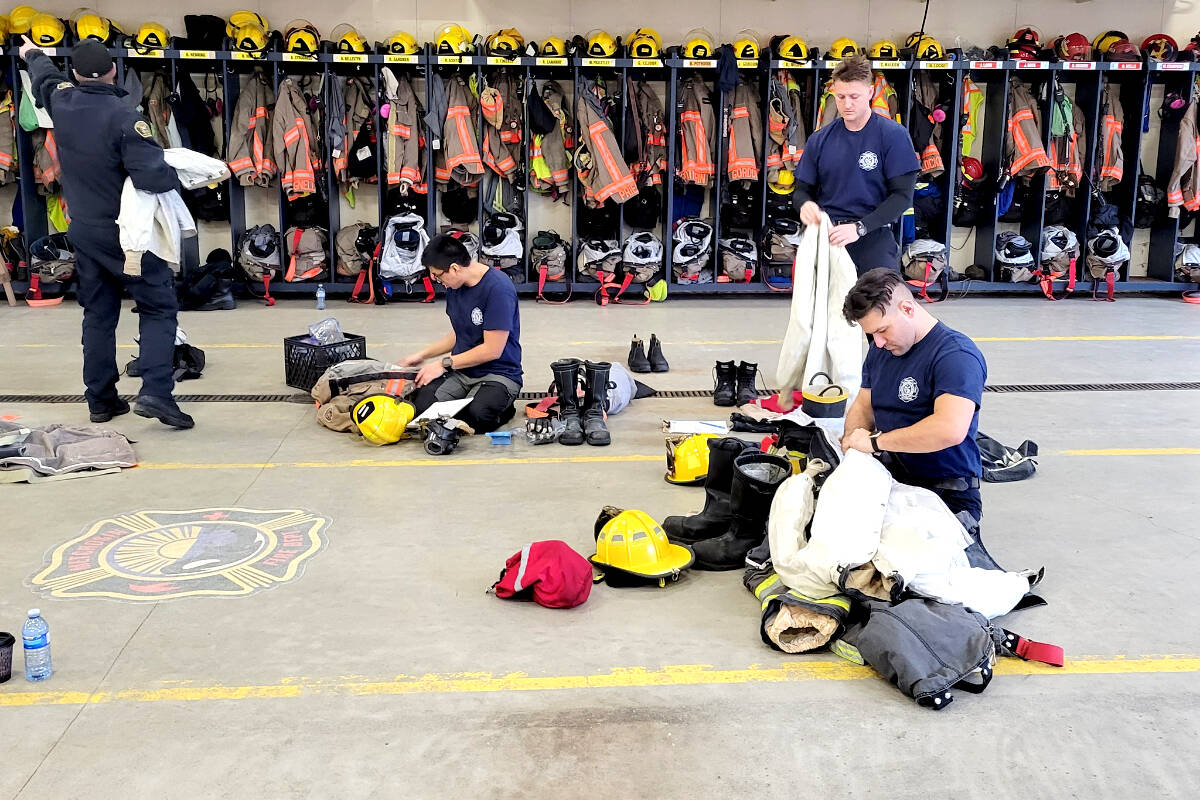 Firefighter recruits learn the basics of their kit during training at the Sooke Firehall. Sooke, Metchosin, and East Sooke fire departments are training 13 recruits to become firefighters over the next several months. (Sooke Fire Rescue – Facebook)
