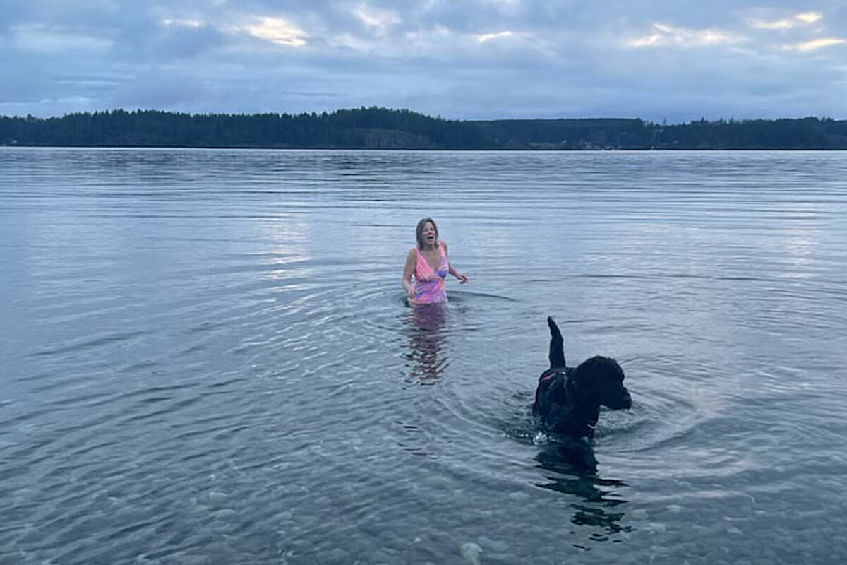 Sandra Chow emerges from the frigid Strait of Georgia by the Tyee Spit in Campbell River Friday morning. Photo courtesy Sandra Chow