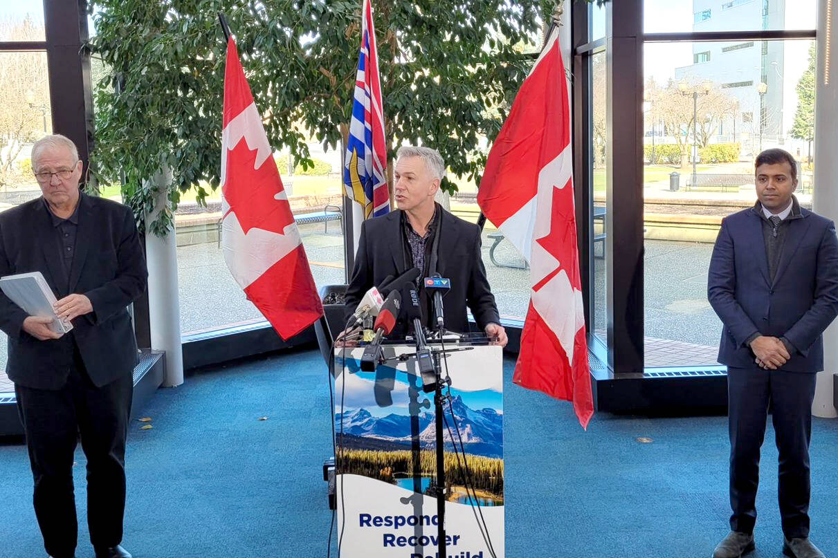Abbotsford Mayor Ross Siemens speaks during a press conference on Feb. 23, flanked by Emergency Preparedness Minister Bill Blair (left) and Taleeb Noormohamed, MP for Vancouver Granville and Chair of the Liberal Pacific Caucus Chair. (Photo: City of Abbotsford)