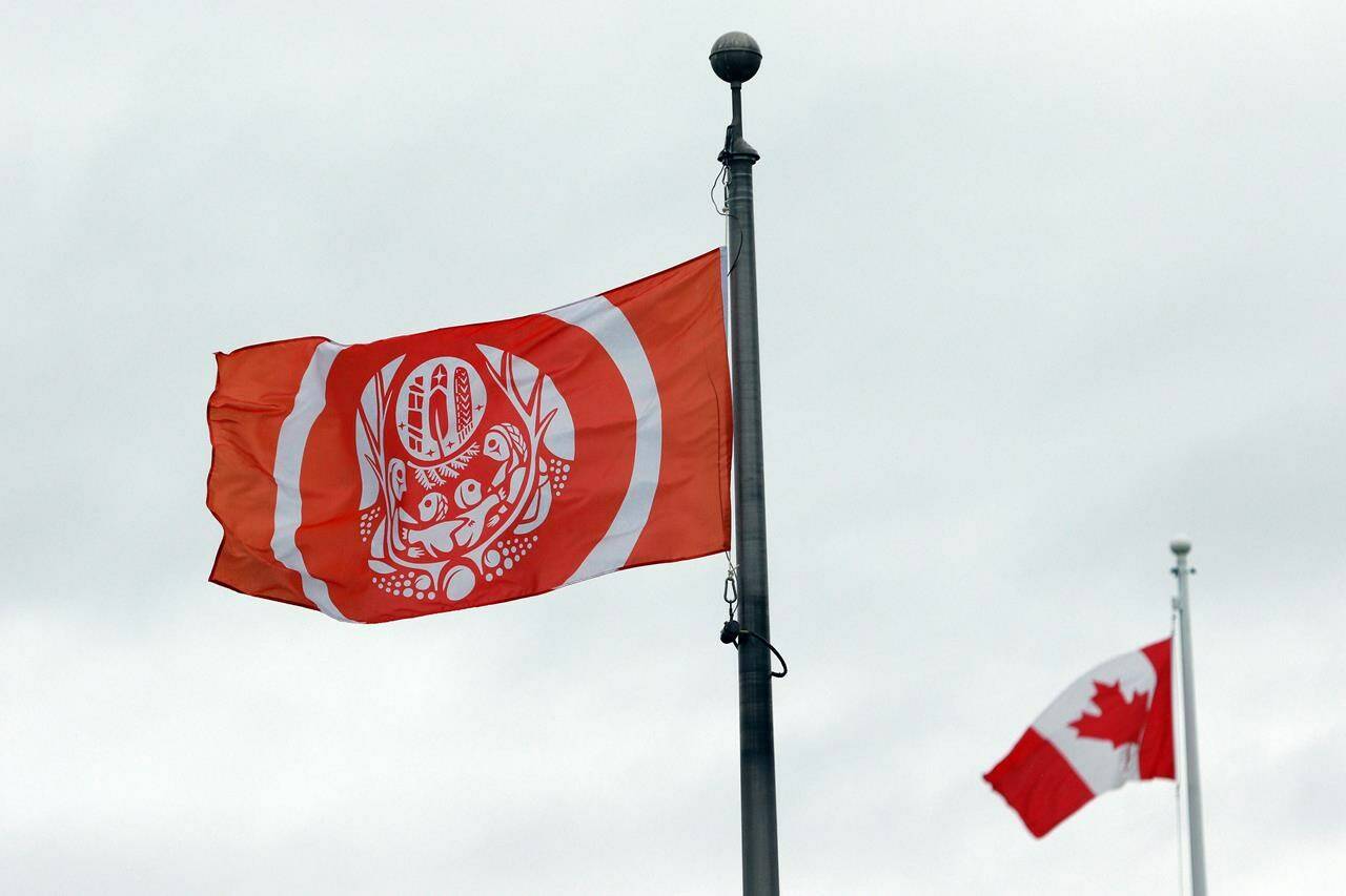 The Survivors’ Flag hangs to honour Indigenous Peoples who were forced to attend residential schools, on the grounds of the legislature in Victoria, B.C., on Wednesday, Sept. 28, 2022. On Tuesday, Tseshaht First Nation announced the preliminary results of an 18-month research-and-scanning effort to identify those who died at the Alberni Indian Residential School (AIRS), which operated from 1900 to 1973. THE CANADIAN PRESS/Chad Hipolito