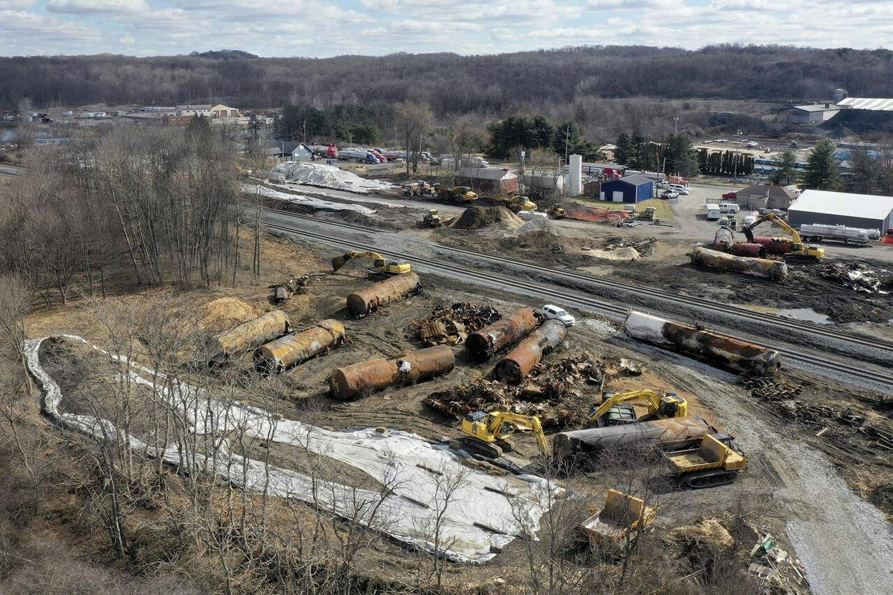 A view of the scene Friday, Feb. 24, 2023, as the cleanup continues at the site of of a Norfolk Southern freight train derailment that happened on Feb. 3 in East Palestine, Ohio. (AP Photo/Matt Freed)