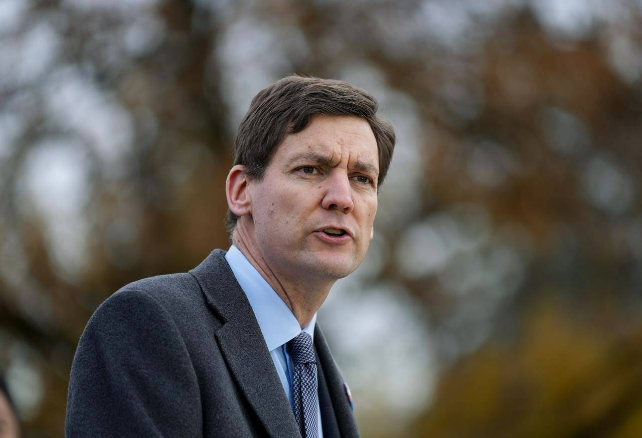 B.C. Premier David Eby makes an announcement in Vancouver on Sunday, Nov. 20, 2022. Three members of a family that had newly arrived from Afghanistan were the victims of a multi-vehicle crash in British Columbia's Interior on Wednesday. THE CANADIAN PRESS/Darryl Dyck