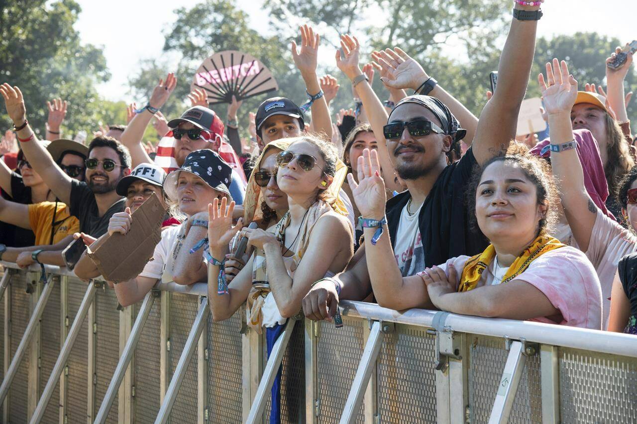 The long-running Vancouver Folk Festival is back for another year, less than two months after funding issues threatened to permanently cancel the event. Festivalgoers are seen on the second weekend of the Austin City Limits Music Festival at Zilker Park on Sunday, Oct. 16, 2022, in Austin, Texas. THE CANADIAN PRESS/AP-Photo by Amy Harris/Invision/AP