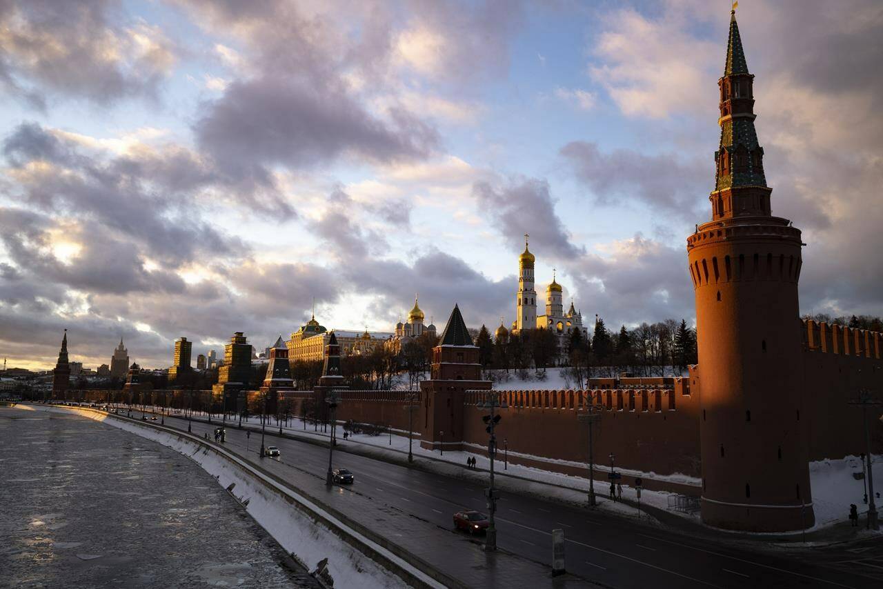 Sunset lights the Kremlin and frozen Moscow River in Moscow, Russia, Sunday, Jan. 16, 2022. THE CANADIAN PRESSAP, Alexander Zemlianichenko