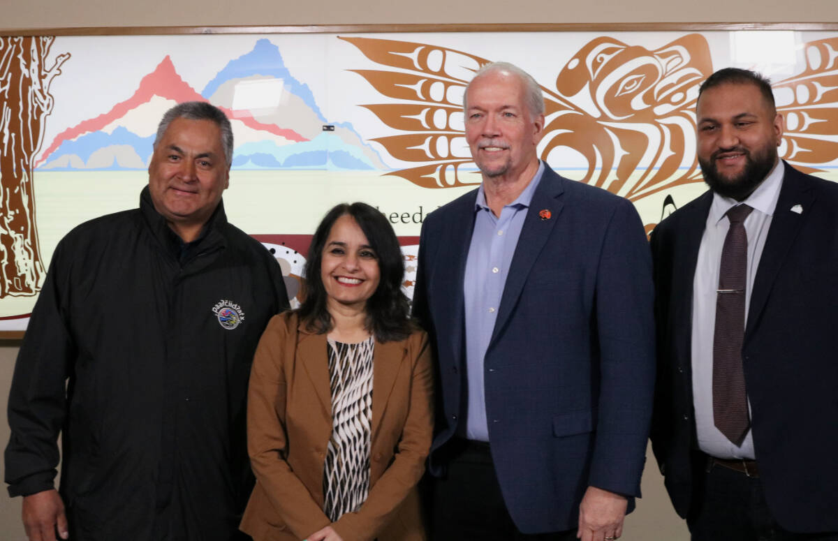 From left to right: Pacheedaht First Nation Chief Jeff Jones, Rachna Singh, Minister of Education and Child Care, Langford-Juan De Fuca MLA John Horgan, and Sooke School District board chair Ravi Parmar at the announcement on Friday (March 31) at the Sooke School District office in Langford. (Bailey Moreton/News Staff)