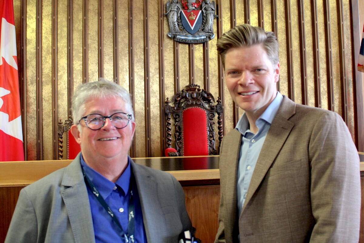 Victoria Mayor Marianne Alto and Saanich Mayor Dean Murdock after a joint meeting on the process of organizing a citizen’s assembly that will study amalgamating the two communities or certain services. (Jake Romphf/News Staff)