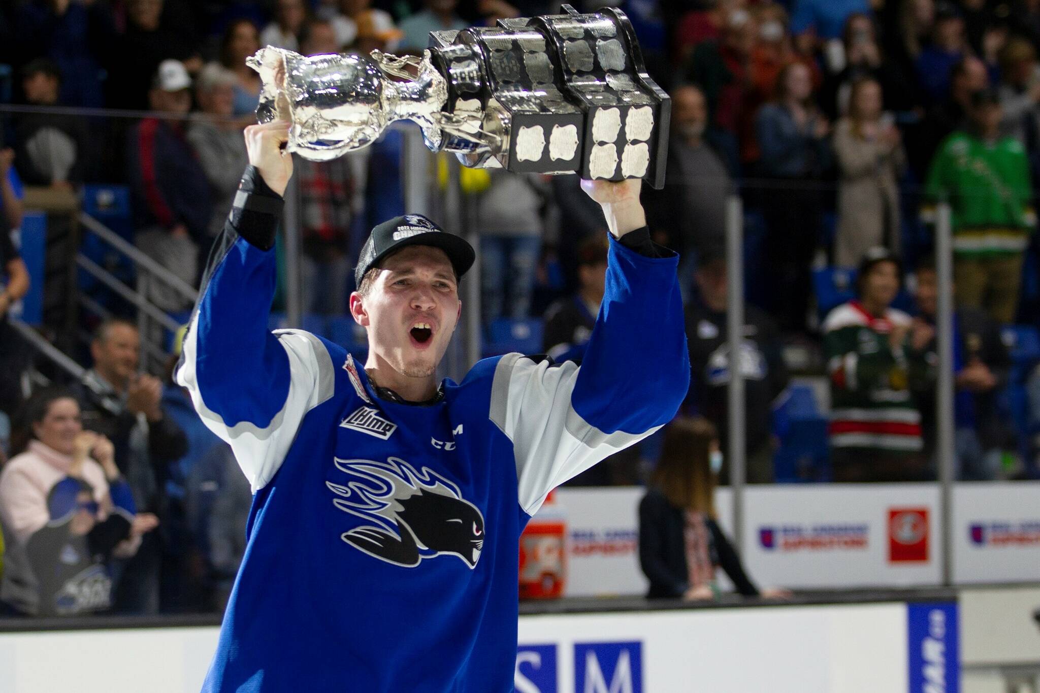 Saint John Sea Dogs’ Yan Kuznetsov celebrates with the Memorial Cup after Saint John beat the Hamilton Bulldogs in Saint John, N.B., Wednesday, June 29, 2022. THE CANADIAN PRESS/Ron Ward
