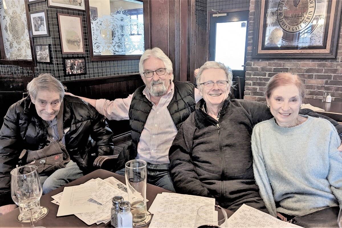 Bridge players Duncan Smith, left, Jim McAvoy, Doug Fraser, Sandra Fraser enjoy a post-game review at the Penny Farthing in Oak Bay. (Courtesy Monterey Bridge Club)