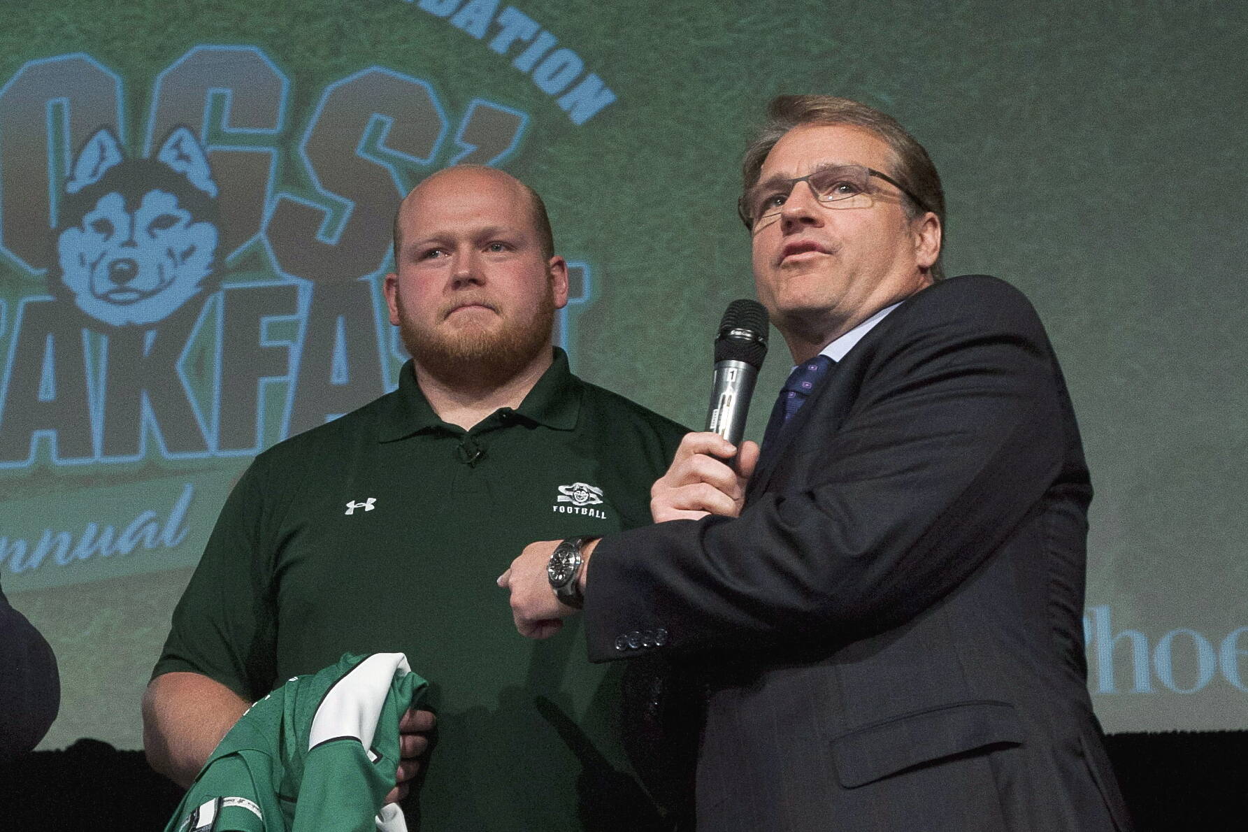 Glen Suitor (right) is one the SFU alumni furious with the way the university’s storied football program has ended. THE CANADIAN PRESS/Liam Richards