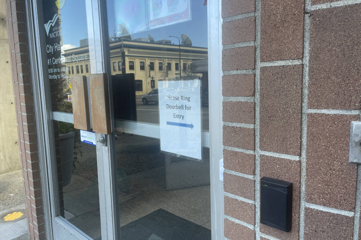 The doors to Victoria City Hall have been locked since late October 2022. Visitors can get in using a doorbell. (Hollie Ferguson/News Staff)