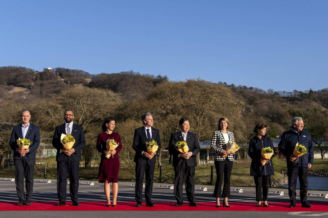 From left, European Union Deputy Secretary General and Political Director of the European External Action Service Enrique Mora, British Foreign Secretary James Cleverly, German Foreign Minister Annalena Baerbock, U.S. Secretary of State Antony Blinken, Japan’s Foreign Minister Yoshimasa Hayashi, Canada’s Foreign Minister Melanie Joly, France’ Foreign Minister Catherine Colonna, and Italy’s Foreign Minister Antonio Tajani, pose for members of the media as they arrive at Karuizawa Station for a G7 Foreign Ministers’ Meeting in Karuizawa, Japan, Sunday, April 16, 2023. THE CANADIAN PRESS/AP-Andrew Harnik