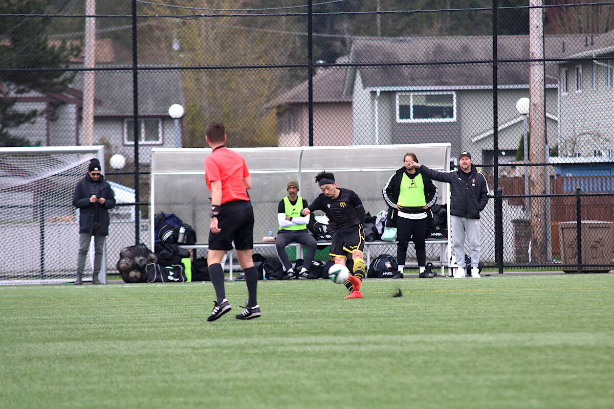 Yuta Yamato drives the ball into the attacking zone during the Cowichan 49ers 3-1 victory over PCOV Sunday afternoon. (Sarah Simpson/Citizen)