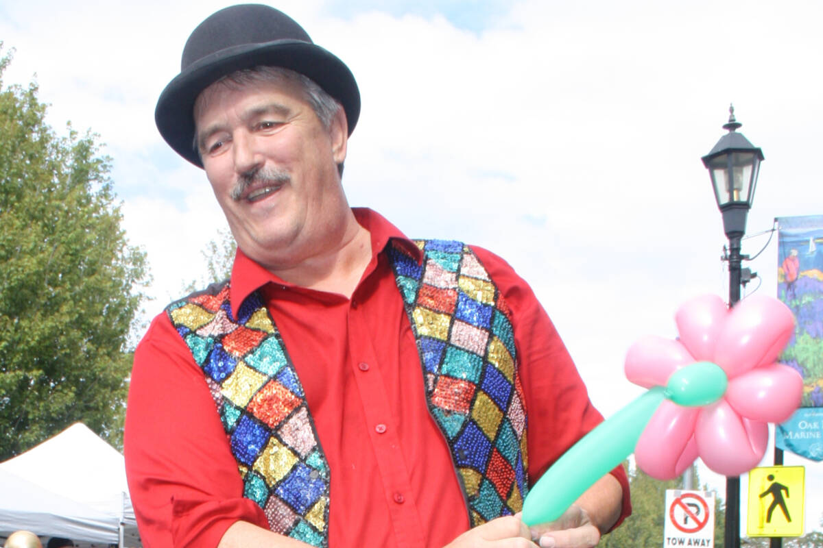 Entertainer Paul Kilshaw is known for his balloon creations at the Oak Bay Night Market and other venues. (Black Press Media file photo)