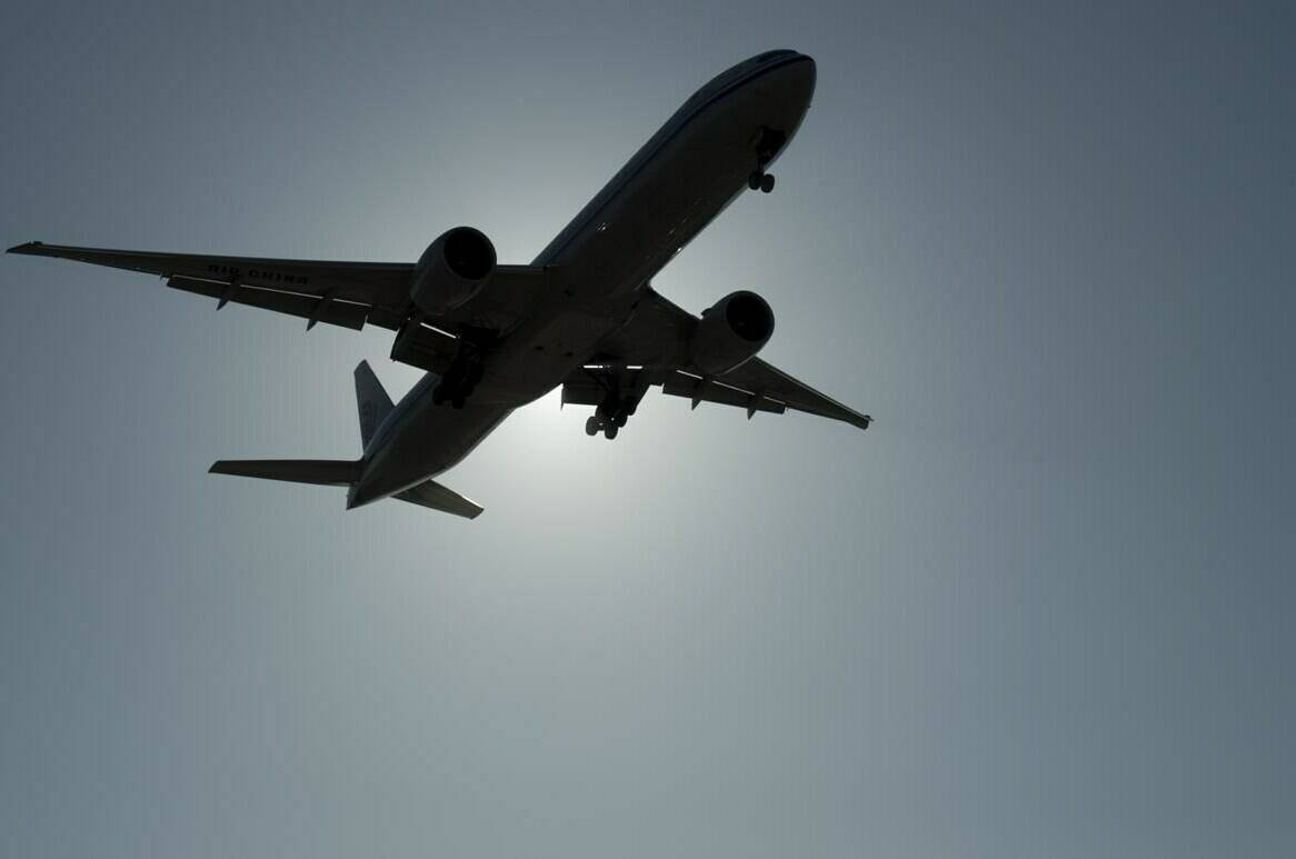 The Russian airspace ban means pricier flights for Canadian travellers and airlines. A flight arrives at Vancouver International Airport in Richmond, B.C. Wednesday, March 18, 2020. THE CANADIAN PRESS/Jonathan Hayward